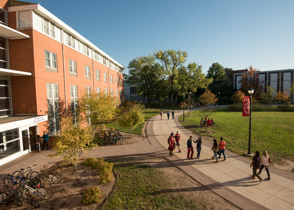 Northpointe Residence Hall path with students walking on the Metropolitan Campus.