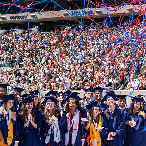 students_at_commencement_in_metlife_stadium